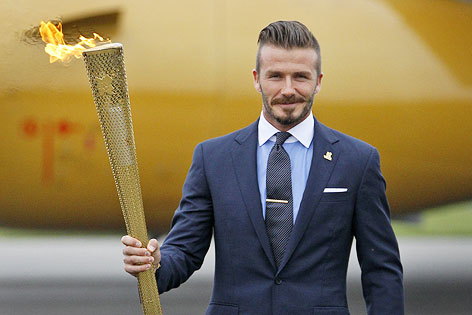 David Beckham mit der Olympischen Fackel